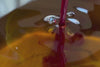 Slow-motion video of botanical oils being mixed to create Oléwà, Roake’s nourishing body elixir.